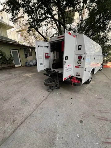 Magnet Plumbing service vehicle on-site for Grease Trap Cleaning in Carderock Springs